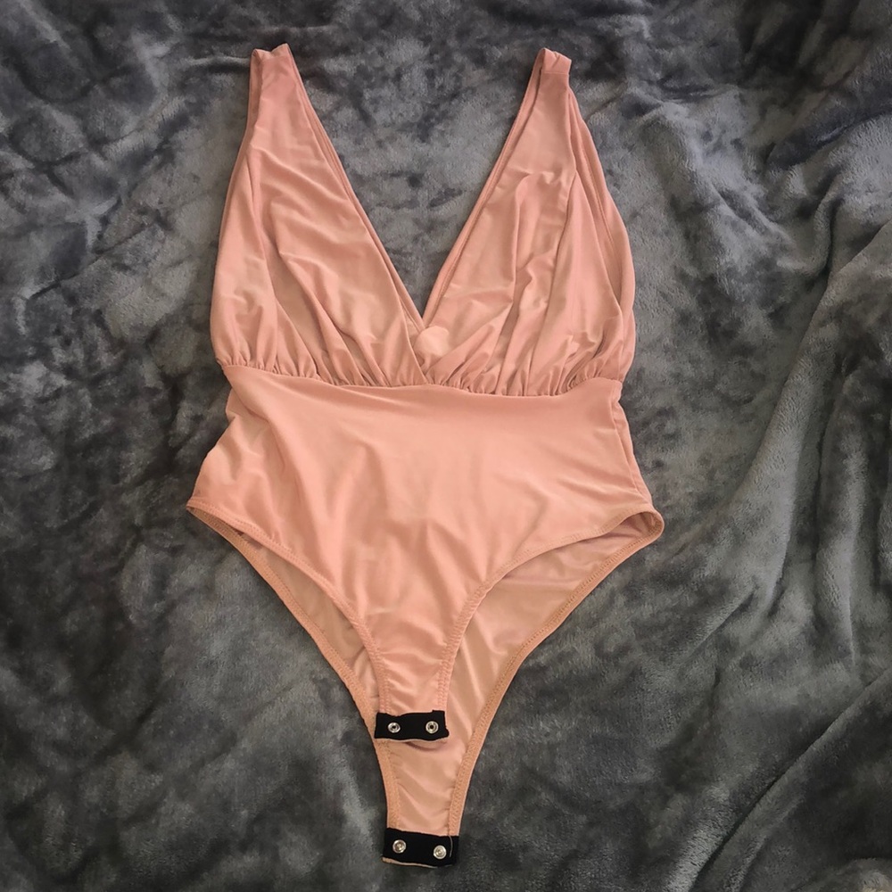 tan/orange bodysuit